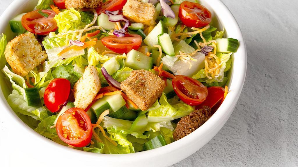 Garden · Iceberg and romaine lettuce, diced cucumbers, grape tomatoes, cheddar cheese, and croutons.