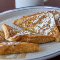 French Toast · Two pieces of Texas toast dipped in cinnamon custard.