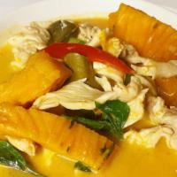 Chicken Pumpkin Red Curry · Sala thai style chicken red curry with nuggets of golden pumpkin with bamboo shoots and basil.