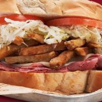Corned Beef And Cheese · Served with cheese, fries, slaw and tomato on Italian Bread.