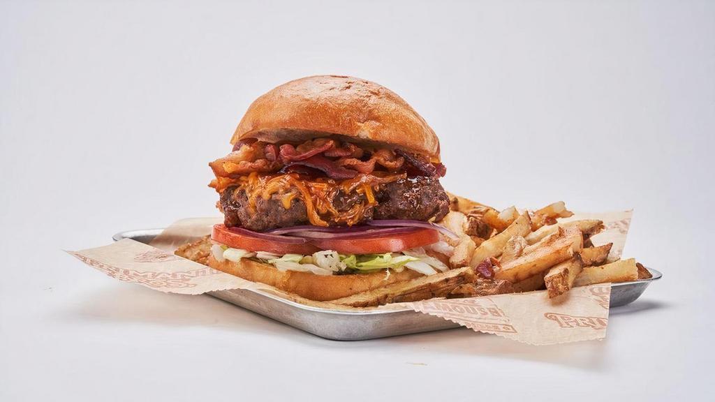 Bbq Bacon Cheddar Burger · 1/2 lb fresh patty, smoky BBQ sauce, bacon, shredded cheddar, lettuce, tomato and red onion.