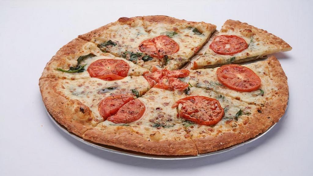 White Pizza · Garlic sauce, Parmesan and mozzarella cheeses,. roasted tomato, fresh spinach.