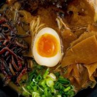 Signature Tonkotsu · Our most popular ramen: pork bone broth that is delightfully full-bodied and silky smooth. T...