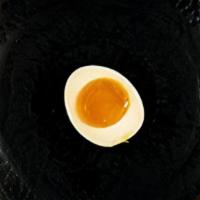 Extra Half Egg · Extra side of soy-marinated half egg.