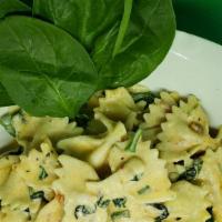 Spinach &  Bowtie Pasta  · Sautéed Spinach, Cherry tomatoes, Onions and Roasted garlic, Mushroom cream sauce and Shaved...