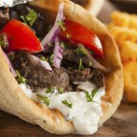 Gyro · Gyro Meat, Onions, Tomatoes, Pitted Olives, Feta Cheese, and Tzatziki Sauce.