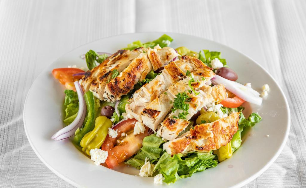 Mediterranean Chicken Salad · Fresh mix greens, tomatoes, cucumbers, onions, Greek olives, feta cheese, green peppers, hard-boiled egg, pepperoncini topped with grilled chicken breast. Choice of dressing.