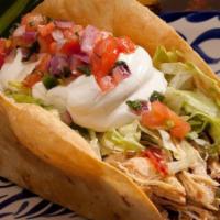 Taco Salad · A large crispy flour tortilla filled with your choice of protein and cheese sauce. Topped wi...