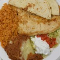 Pollo Loco · Seasoned grilled chicken breast. Served with rice, beans, tortillas, and guacamole, lettuce,...
