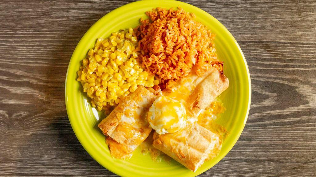 Pollo Fundido · Our famous spicy chicken blended with jalapeño, topped with cheese sauce and sour cream. Served with rice, beans and tortillas.