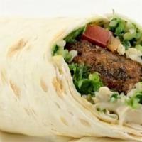 Falafel With Tabouli Wrap · Falafel patties, tabouli, hummus, and pickle, with baba dressing.