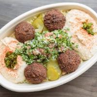 Veggie Bowl · Baba rice, falafel, tabouli, hummus and baba ghanoush, with a pickle garnish.