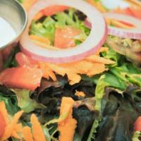 House Salad · Spring mix with carrots, onions, tomato with Balsamic vinaigrette.
