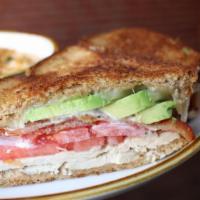 Turkey Bacon Thyme Sandwich · Herb roasted turkey on whole wheat with house bacon, Havarti, tomato and creamy thyme dressi...