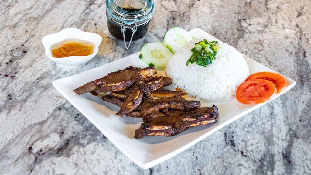 Beef Short Ribs Grilled Rice (Cơm Sườn Bò) · Grill short ribs rice short ribs marinated with garlic, lemongrass and honey.