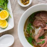 Rare Thin Sliced Pho (Phở Tái) · Tenderloin thin sliced beef noodle soup with herbs., bean sprouts, ...