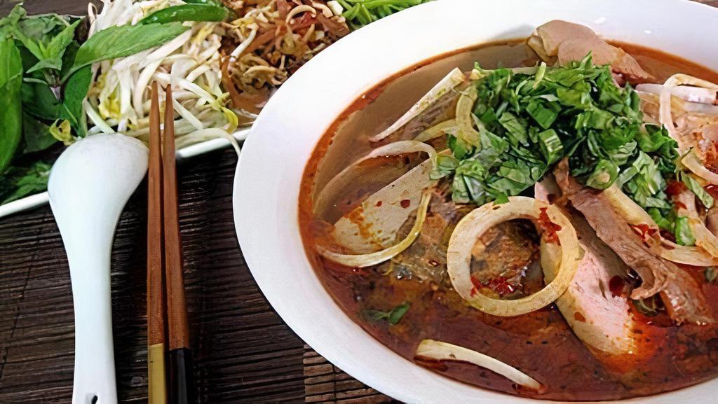 Beef And Meatball Pho (Phở Tái Bò Viên) · Beef and meatballs noodle soup with herbs, bean sprouts and more.