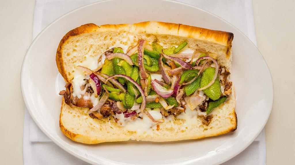 Philly Beef (8 Inch) · A select cut of hand sliced roast beef dipped in au jus and topped with onions, green peppers and mozzarella cheese.
