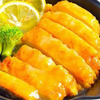 Lemon Chicken · Fried chicken cutlet, that is sliced, over a bed of broccoli and served with a freshly made ...