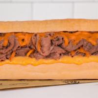 Cheesy Cheddar Beef · Italian bread loaded with President sharp cheddar cheese spread, our signature Italian beef,...