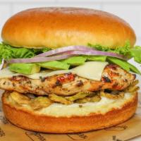 Char-Grilled Chicken Avocado Jack Sandwich · Avocado, lettuce, red onion, crispy jalapenos, mayo, and pepperjack cheese on a brioche bun.