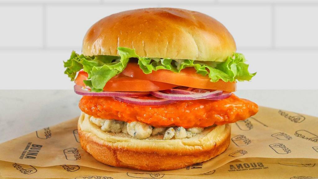 Buffalo Chicken Sandwich · Breaded chicken, buffalo sauce, red onion, lettuce, tomato, blue cheese, and ranch on a brioche bun.