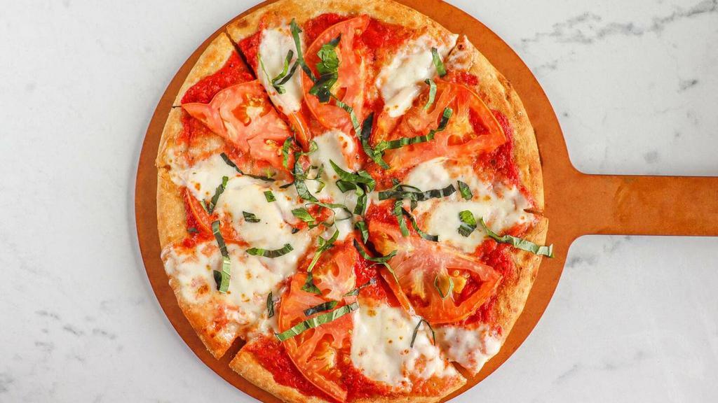 Margherita Pizza · Vine-ripe tomato, fresh Mozzarella and basil