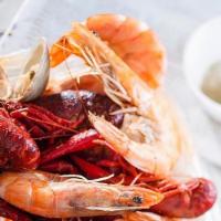 Special: Shrimp + Clams Or Crawfish · Comes with 1/2 lb Shrimp + 1lb Crawfish or Clams + Potatoes (3)