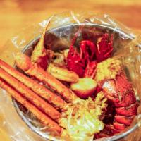 Lovers Cover (For 2) · 1 lb headless or whole shrimp, 1 lobster tail, 1 lb snow crab legs, 1 lb crawfish or clams, ...