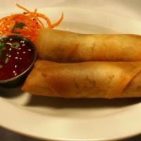 Spring Rolls · House-made filled with shredded chinese vegetables and sweet chili dipping sauce.