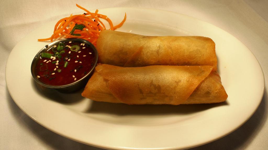Spring Rolls · House-made filled with shredded chinese vegetables and sweet chili dipping sauce.