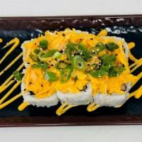 Volcano Roll · tempura fried shrimp, red bell pepper, cream cheese, rolled in nori and sticky rice, topped ...