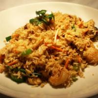 Chicken Fried Rice · Mixed with egg, carrots, peas, bean sprouts, mushrooms, and onions.