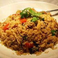 Thai Seafood Rice · Shrimp, scallops, squid, baby corn, snow peas, mushrooms, tomatoes, onions, thai basil, and ...