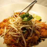 Chicken Pad Thai · Thin rice noodles, egg, onions, thai basil, bean sprouts, carrots, red peppers, peanuts, sca...