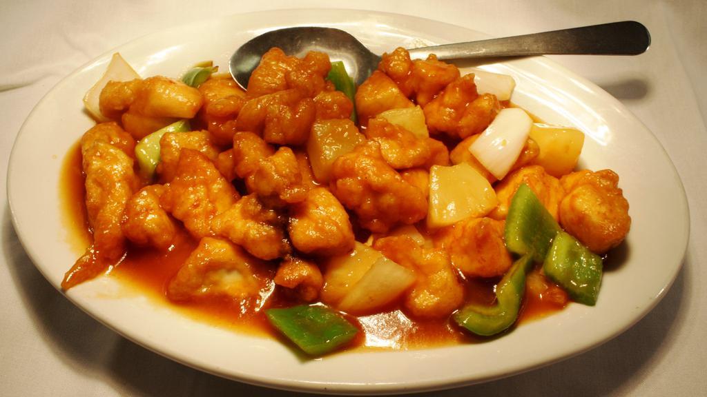 Pineapple Chicken · Crispy fried chicken, bell peppers, and onions in a sweet and sour sauce.