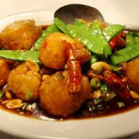 Kung Pao Scallops · Quick- fried scallops, dry roasted peanuts, snow peas, scallions, and chili peppers.