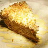 Toasted Coconut Cream Pie · Whipped cream and chocolate sauce.