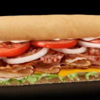 Chicken Cheddar Deluxe · Sliced chicken breast, bacon, cheddar cheese, lettuce, onions, tomatoes & mayo
