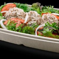 Tuna  · A blend of tuna & mayo with spring mix, onions, tomatoes, oregano & your choice of dressing