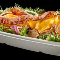 Chicken Bacon Cheddar · Chicken, bacon, cheddar cheese, spring mix, onions, tomatoes & your choice of dressing