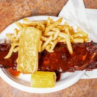 #1 - Bbq Baby Back Ribs · Two full slabs bbq baby back ribs, one lb Greek-style potatoes or French fries, one lb coles...