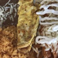 Chilaquiles Rojos O Verdes · With rice & beans, eggs, chilaquiles, red sauce or green sauce.