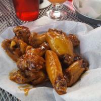 10 Wings · ONE SAUCE PER 10. Most popular. Prepared with your choice of homemade sauce.
