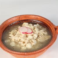 Pozole · Traditional soup. Made from hominy, with meat garnished with onions, Radishes, cilantro, & l...