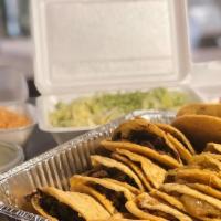 Family Pack Medium · Your Choice of 30 Tacos or  20 gorditas.Includes rice, beans, toppings and salsas.