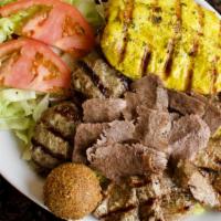 Combination Feast · Combination of shish kabob, kifta kabob, shawarma, chicken tender and falafel served with ri...