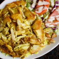 Chicken Shawarma Entree · Thin slices of marinated chicken cooked on a slowly revolving rotisserie served with rice, s...