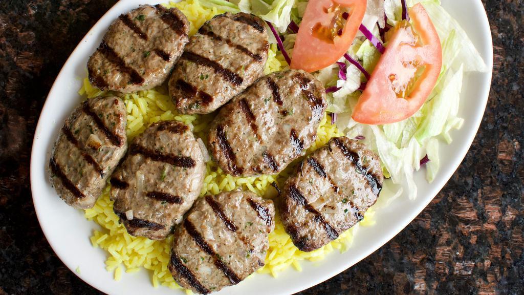 Kefta Kabob Entree · Grilled seasoned ground cuts of tender beef (7 pcs), minced onion and parsley, served with rice, salad and pita bread. Add Fattoush Salad for an additional charge.