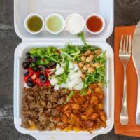 Lamb And Chicken Platter · With rice and salad.